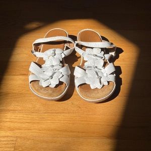 Women’s white sandals. Michelle D